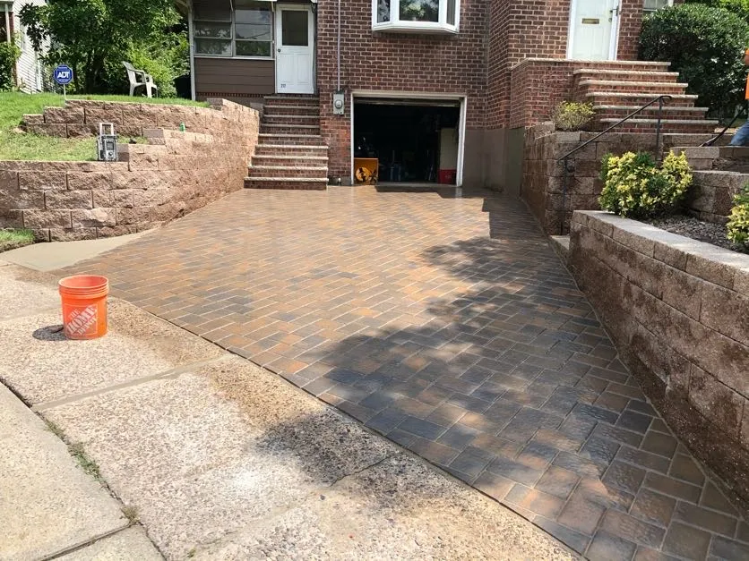Newly installed paver driveway in Leonia, Bergen County, NJ by Masonry Pro Construction, expert masonry and pavers