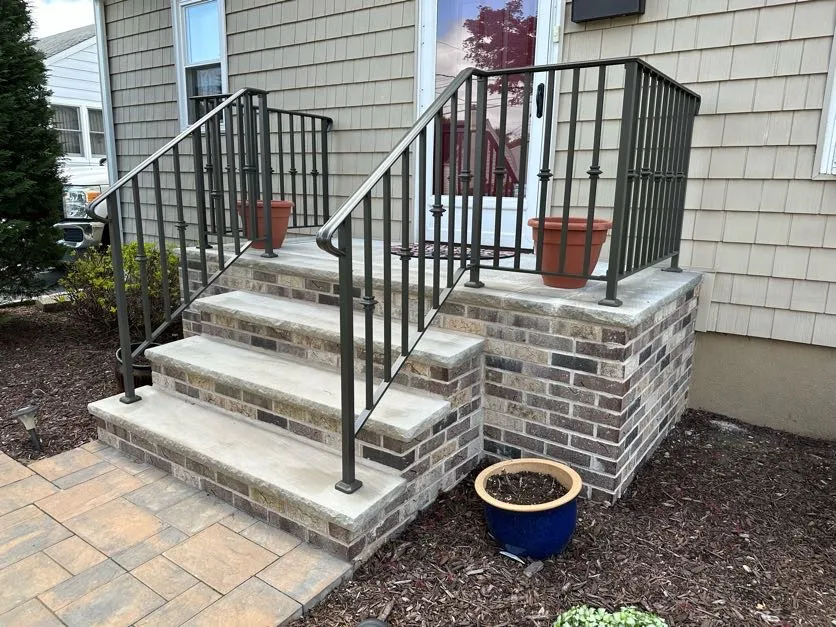 Completed brick masonry front steps at a home in Pompton Lakes, Passaic County, NJ, by Masonry Pro Construction.