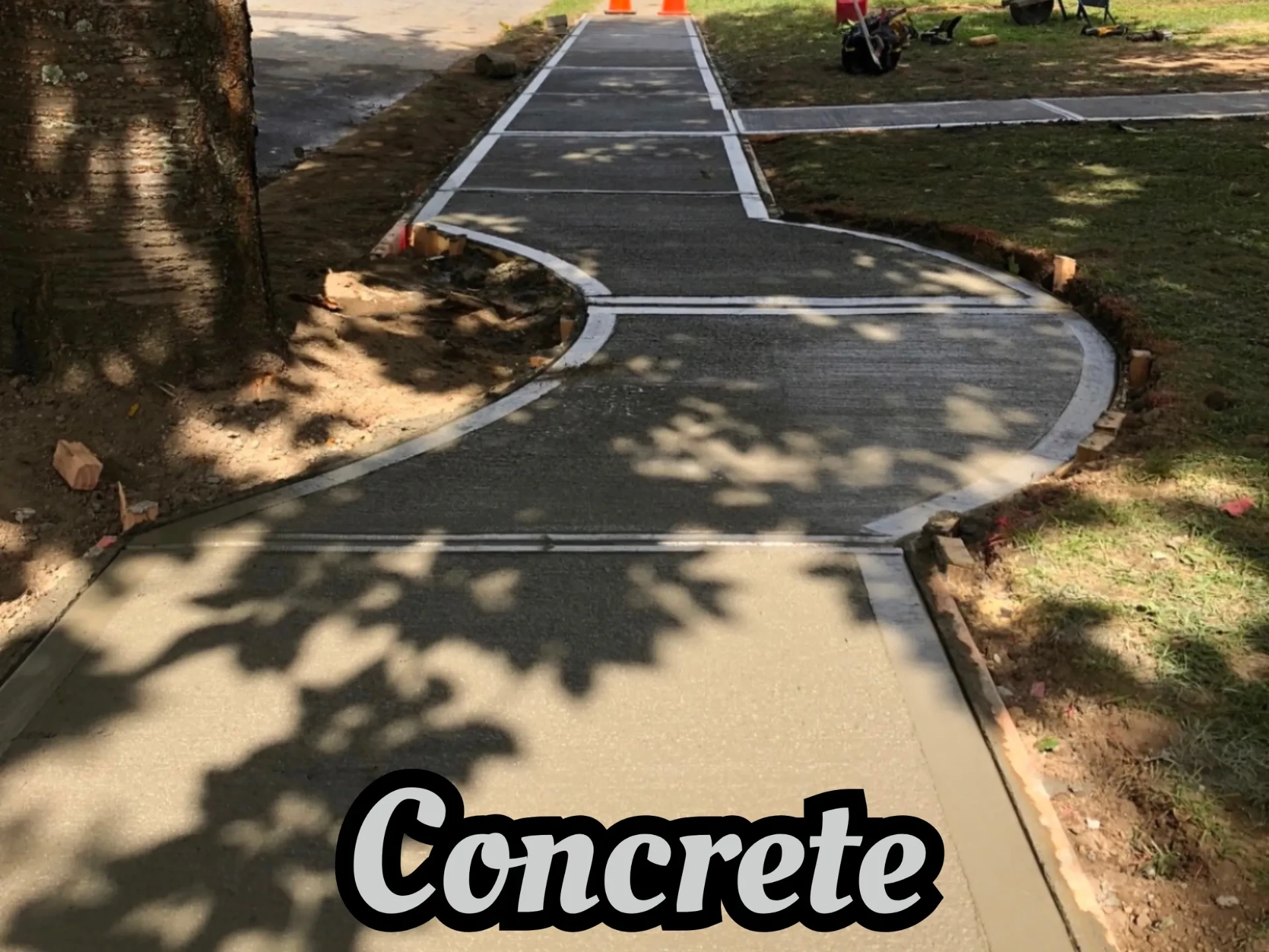 Finished curved concrete sidewalk and walkway at a North Jersey home in Totowa, NJ