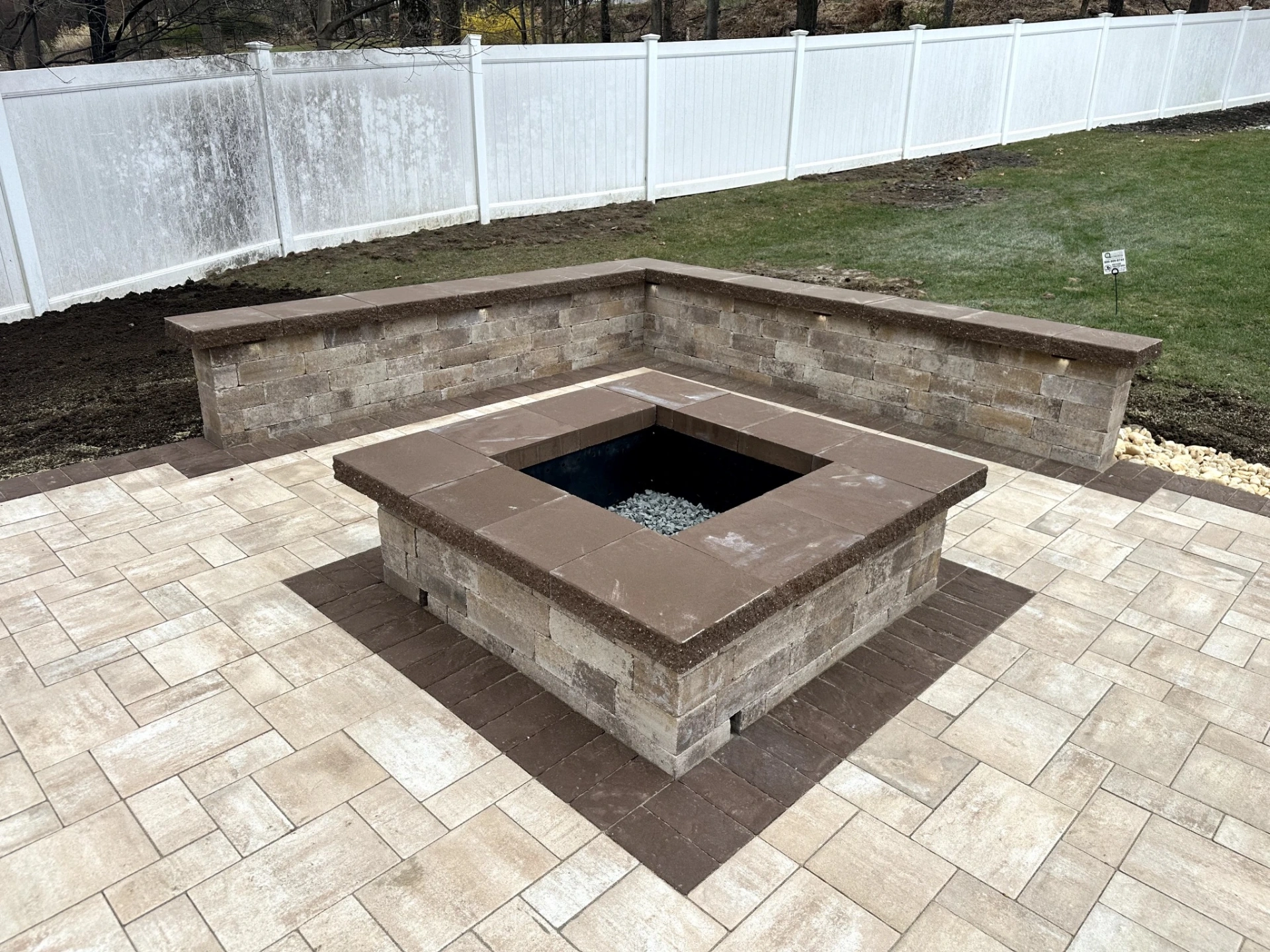 New fire pit installation with stone patio pavers in North Haledon, Passaic County, NJ, by Masonry Pro Construction.