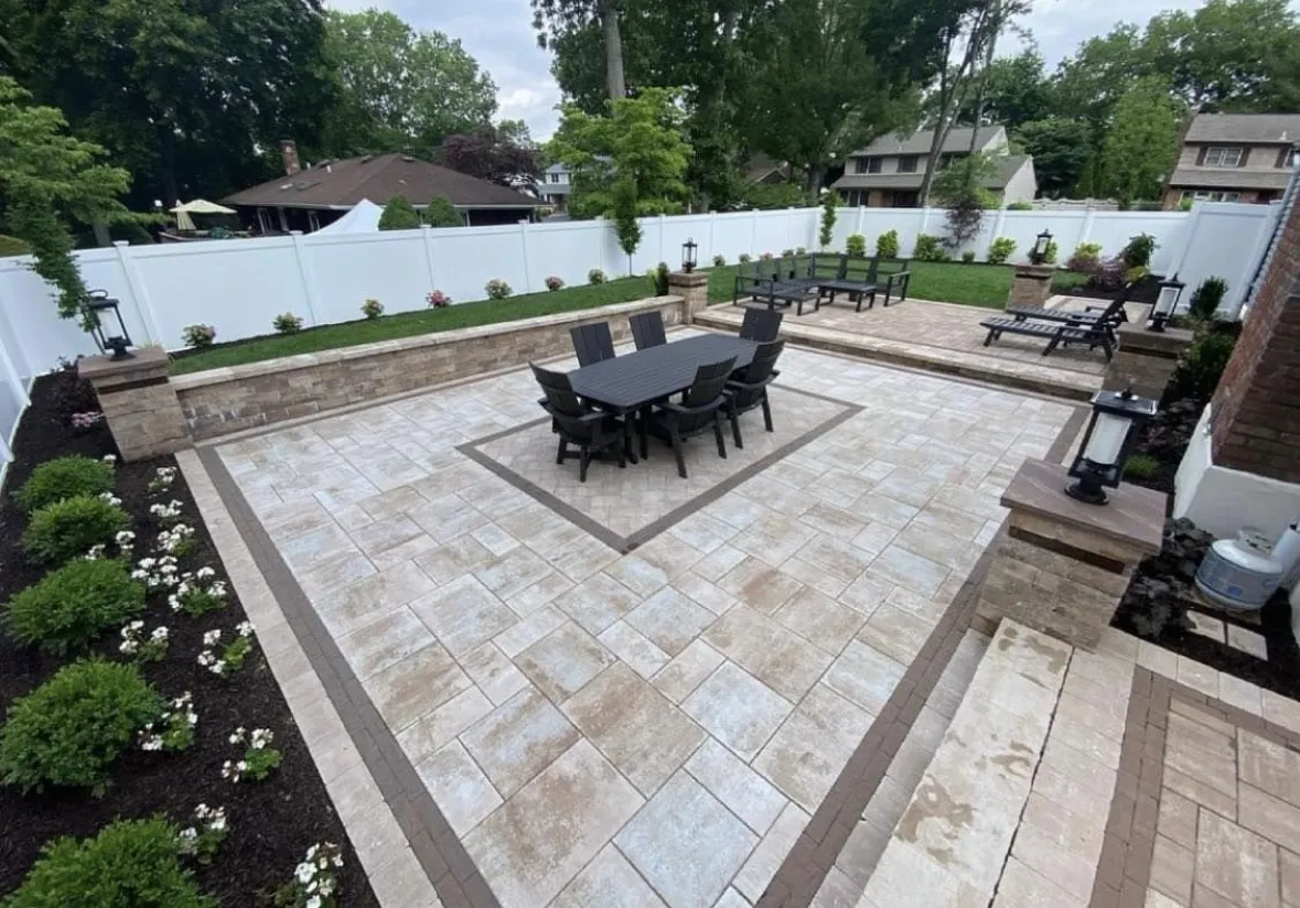Newly installed patio pavers with outdoor dining and seating in Paramus, Bergen County, NJ, by Masonry Pro Construction