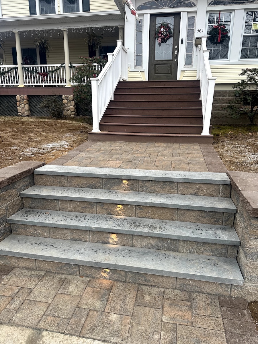 Masonry steps installation and paver walkway leading to a house entrance in New Milford, Bergen County, New Jersey