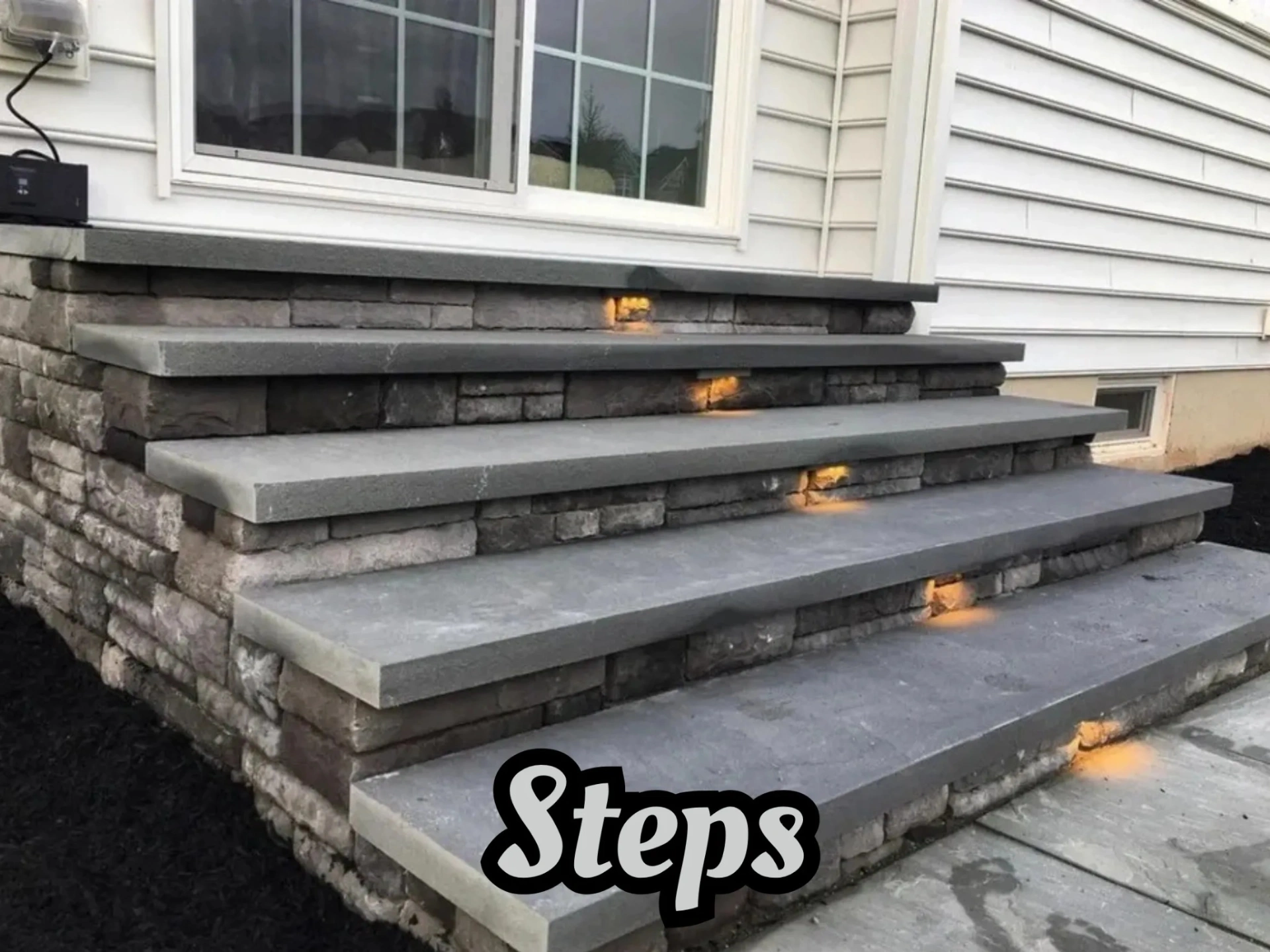 New masonry steps with integrated lighting for a home in Totowa, Passaic County, NJ.