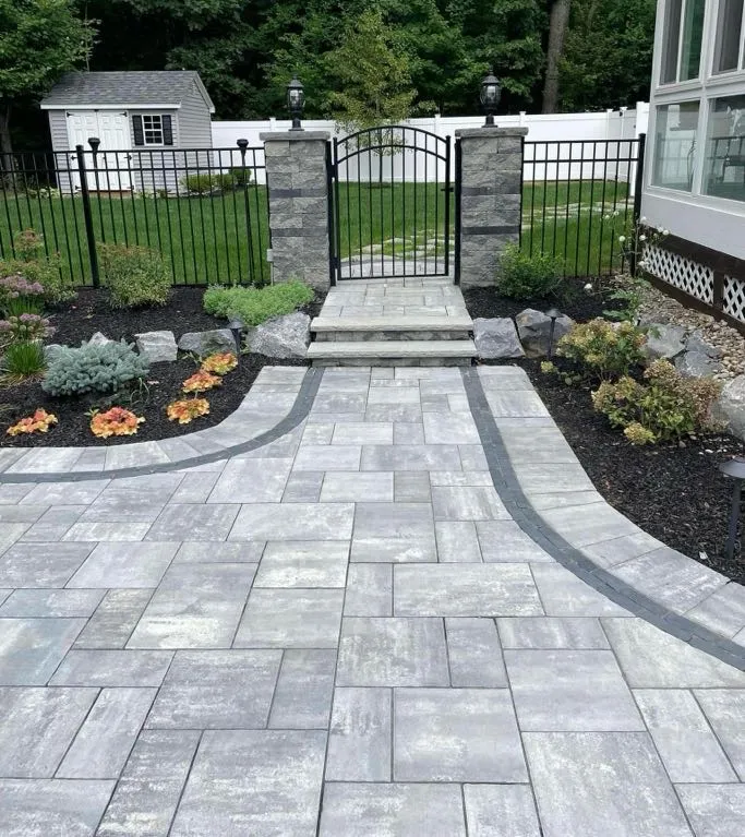 Completed masonry walkway with paver stones leading to the front entrance of a home in Bloomfield, Essex County, New Jersey.
