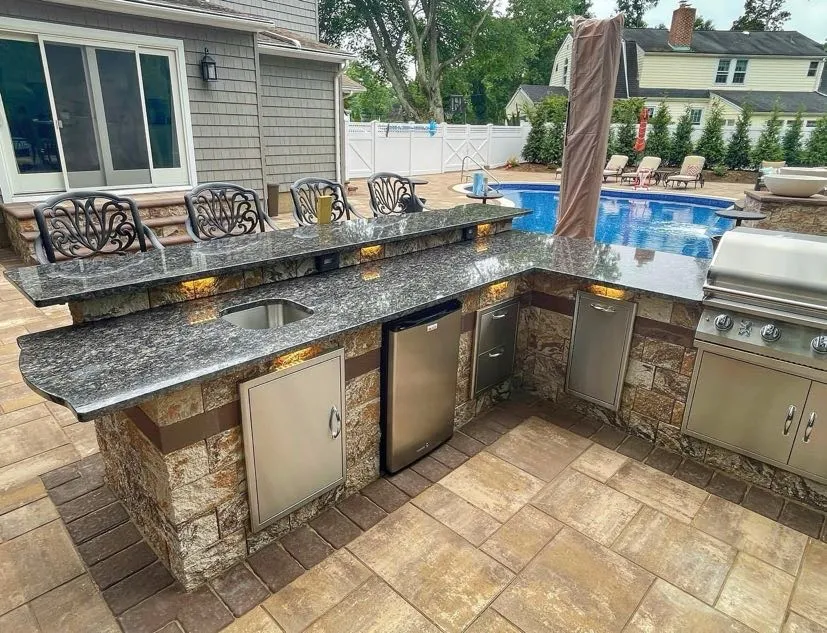 Completed outdoor kitchen installation at a home in Montclair, Essex County, NJ, by Masonry Pro Construction.