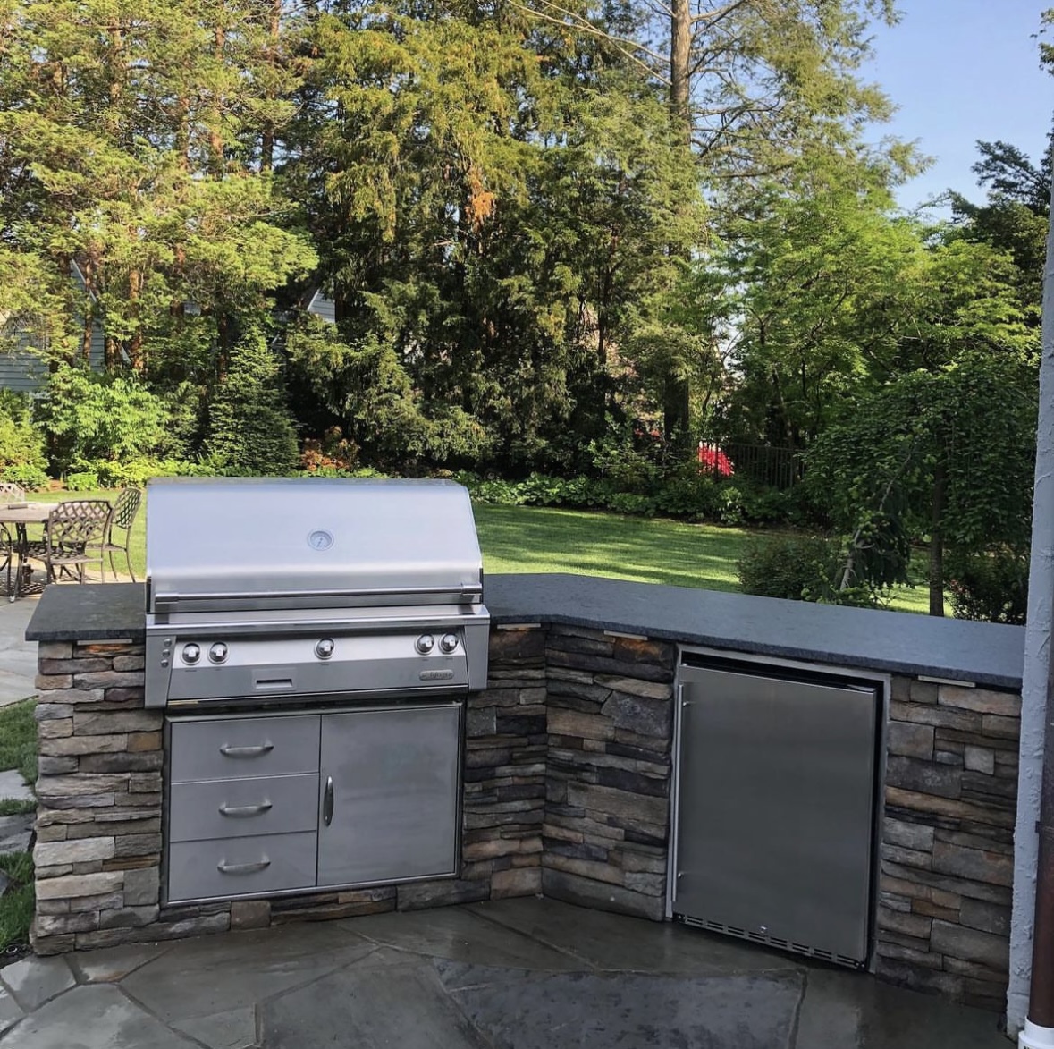 Outdoor kitchen with a built-in grill and refrigerator in Richfield, Clifton, Passaic County, New Jersey