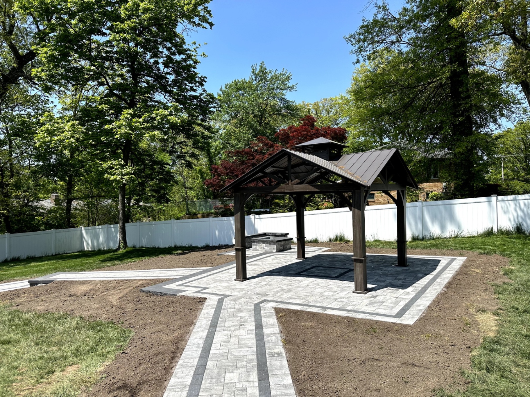 New paver walkway installation with gazebo in a backyard in Pine Brook, Morris County, New Jersey
