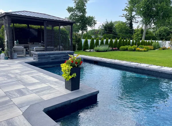Paver patio and pool deck with outdoor kitchen gazebo in Parsippany-Troy Hills, Morris County, NJ, by Masonry Pro Construction.