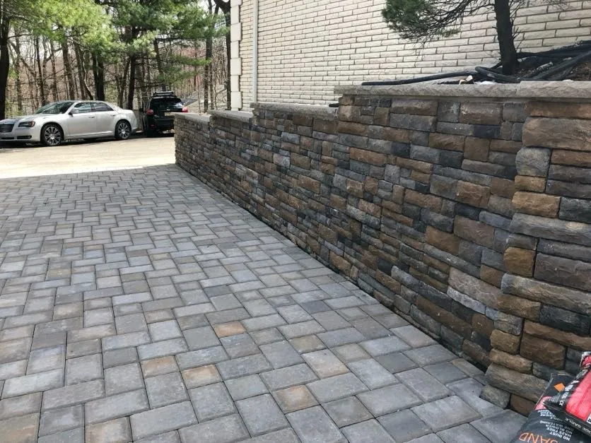 Stone retaining wall repair in Franklin Lakes, Bergen County, New Jersey with pavers