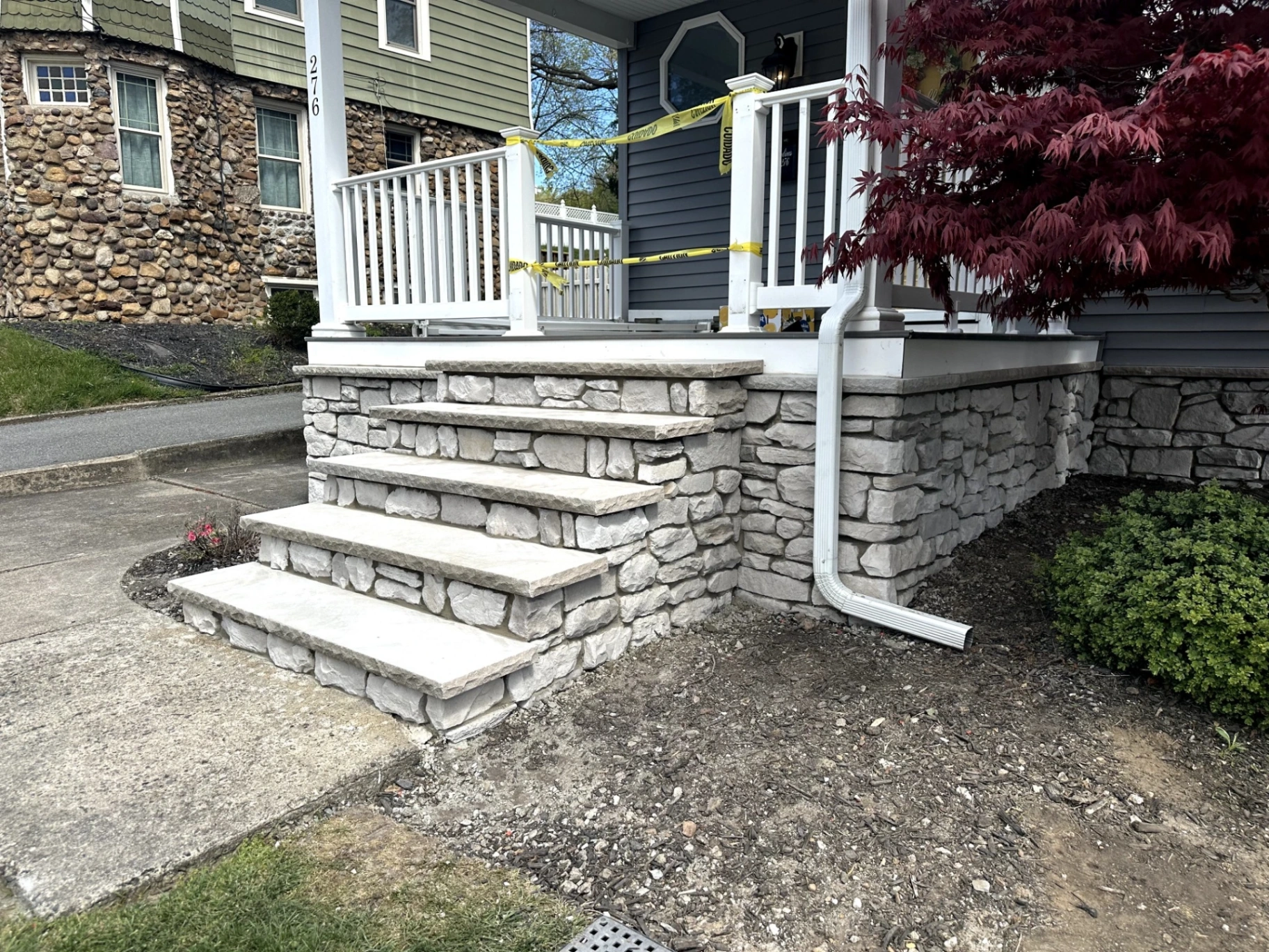 Finished stone masonry steps installation at a residential property in Verona, Essex County, NJ, by Masonry Pro Construction.